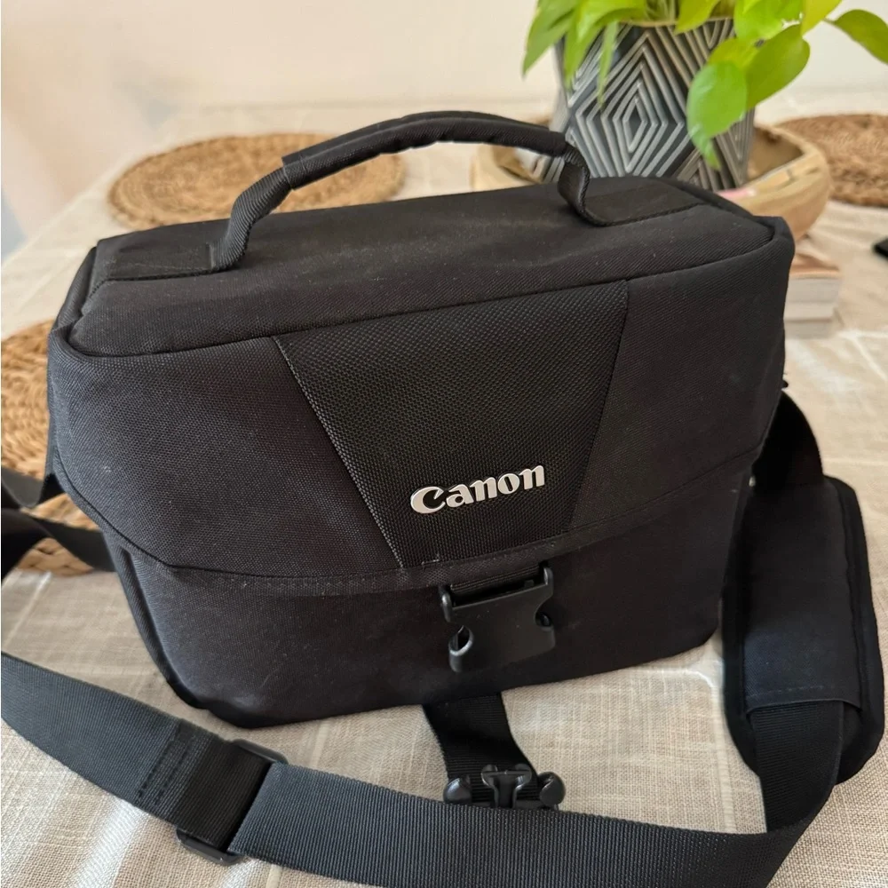 Canon Black Digital Camera with Zoom Lens (Not shown)